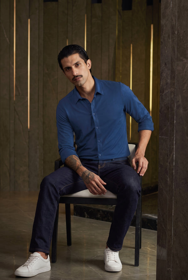 Midnight Blue knit shirt - seated